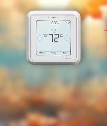 Wi-Fi thermostat on fall background