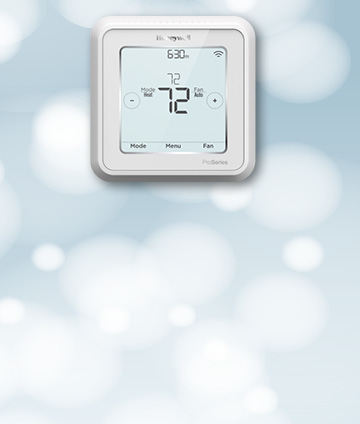 Wi-Fi thermostat on winter background